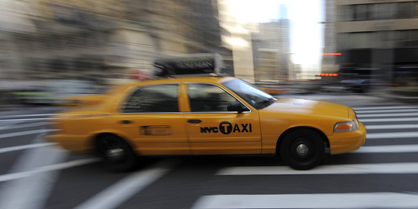 A New York City taxi passes through